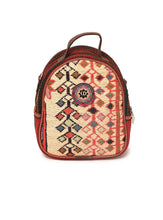 Load image into Gallery viewer, Kardashii Kilim carpet backpack amazing front design perfectly complements the retro-chic aesthetic of the patches kardashian kim kylie